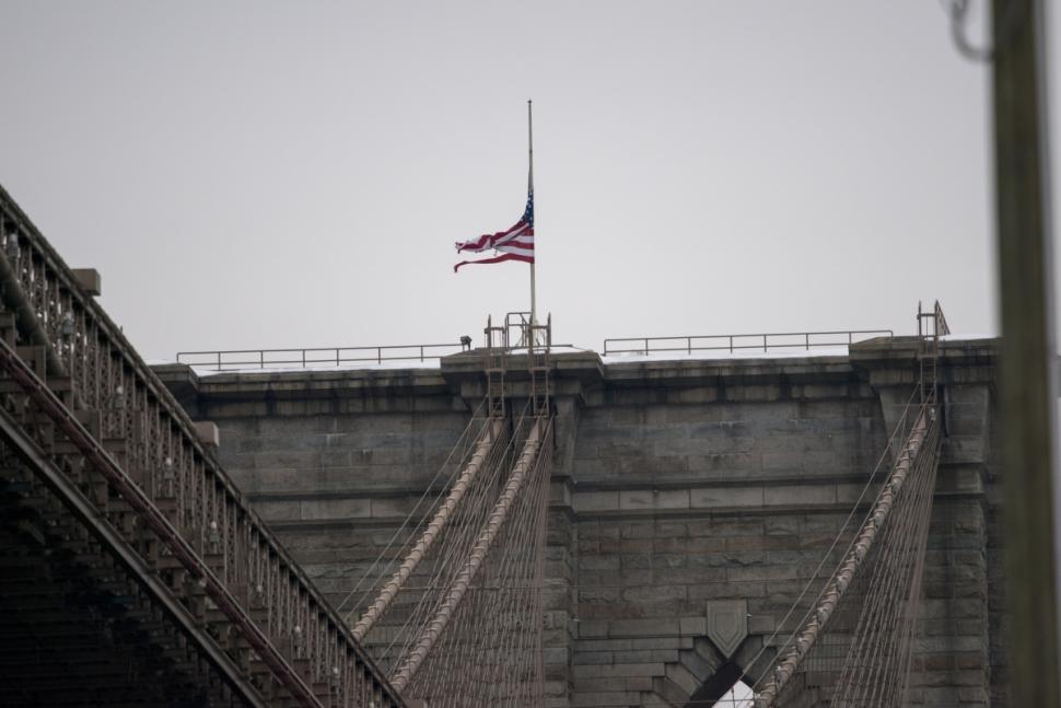 Even The Brooklyn Bridge Flags Are Over The Cold Weather